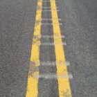 Milled centerline rumble strips on an asphalt pavement