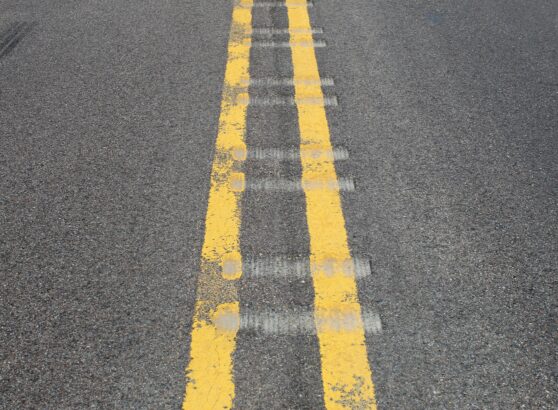 Milled centerline rumble strips on an asphalt pavement